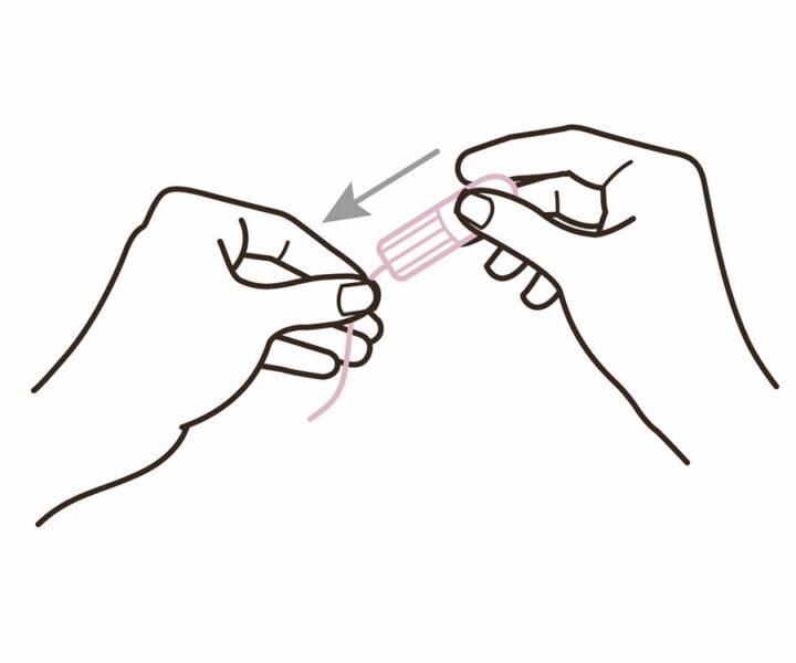 Förbered snöret. Dra försiktigt i snöret så det hänger fritt - det hjälper dig både att känna kontroll och att kunna ta ut tampongen senare.